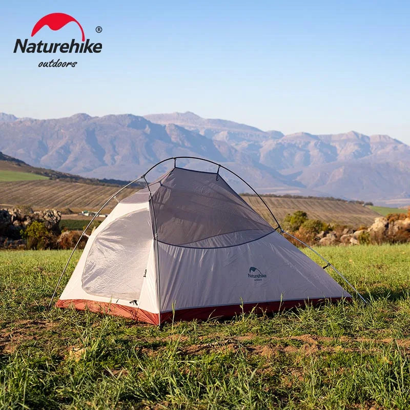 Naturehike Cloud Up compact waterproof tent on grass
