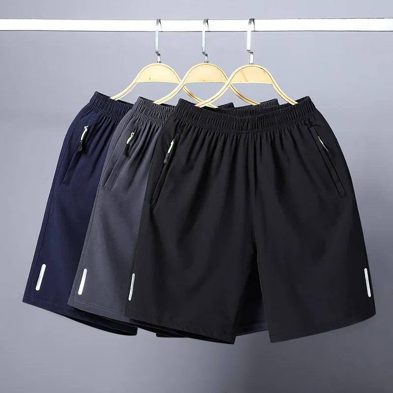"Lightweight quick-dry men's beach shorts on white background"