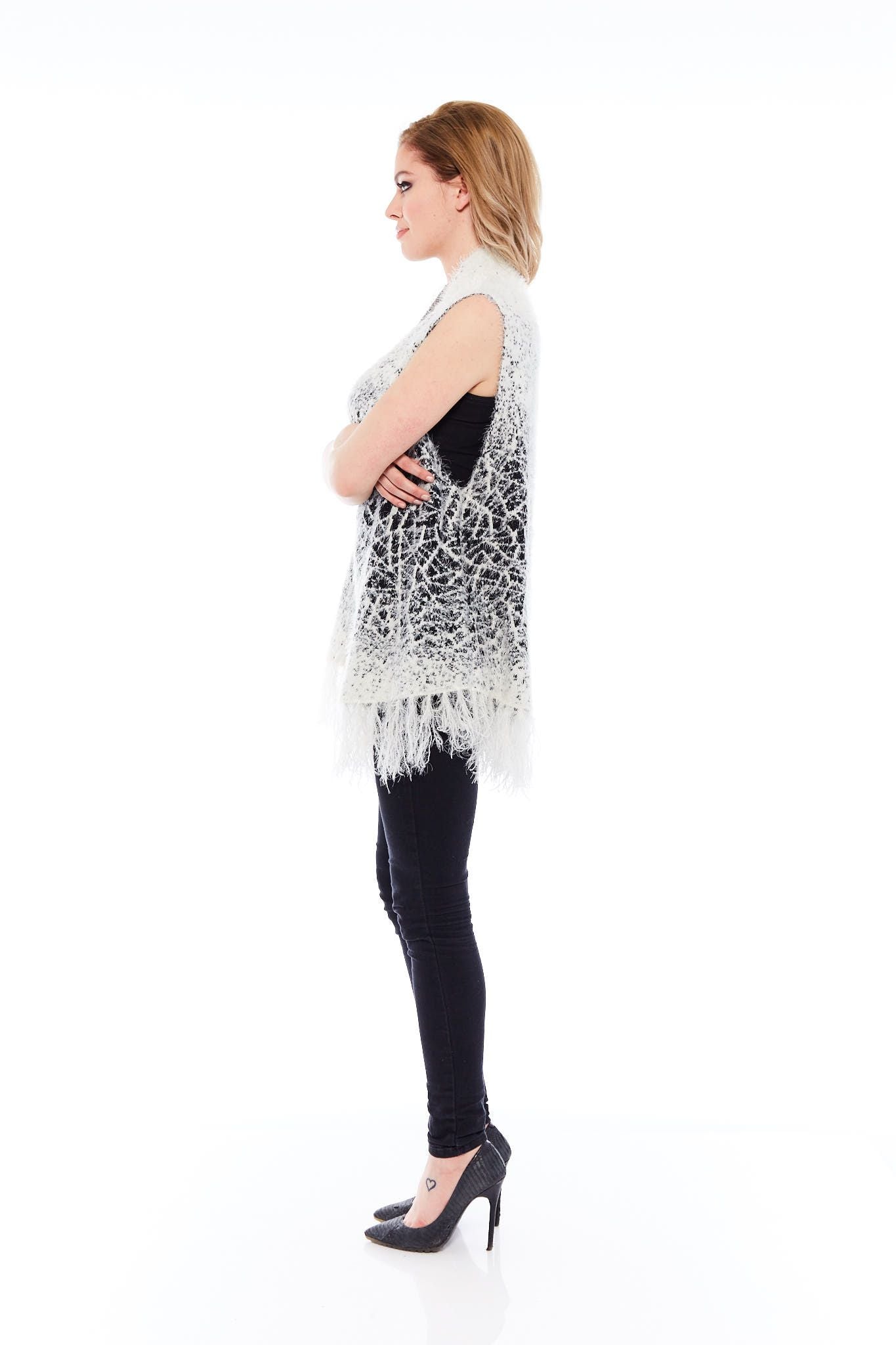 THE TASSEL WINTER SWEATER IN COZY WHITE