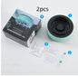 Portable ashtray air purifier removing smoke on table.